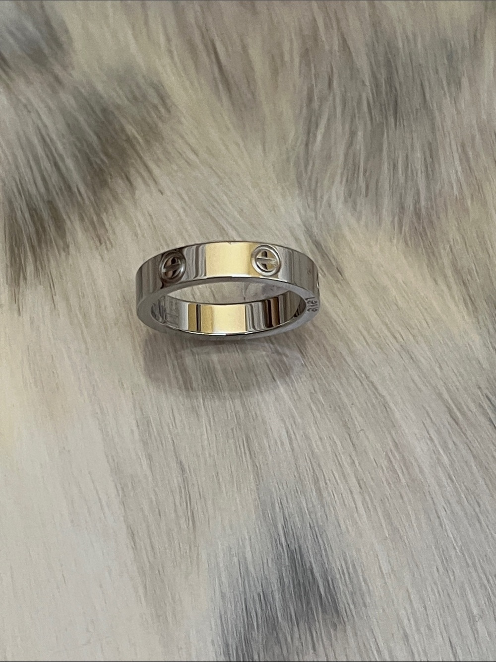 Silver woman’s love ring (6).